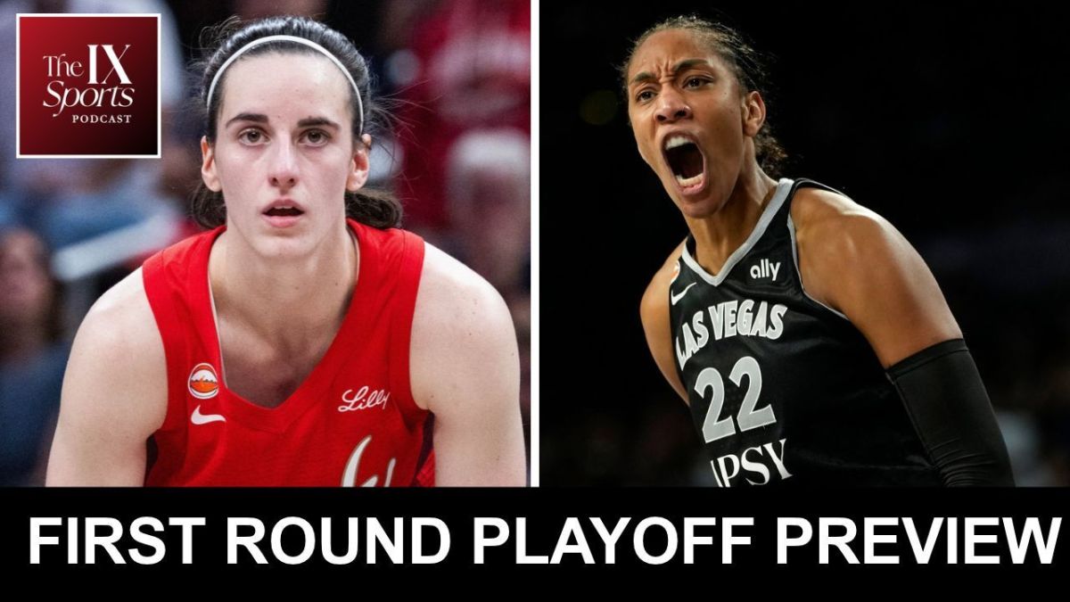 In the upper left corner, white text in a red logo square says The IX Sports Podcast. The main image is split in two. At left, Caitlin Clark stares straight ahead, wearing a red Fever jersey. In the image to the right, A'ja Wilson, wearing a black jersey with "Las Vegas 22" on it shouts in celebration. At the bottom, a black rectangle runs across the bottom of the photo. In white, all-caps text, it says "First round playoff preview."