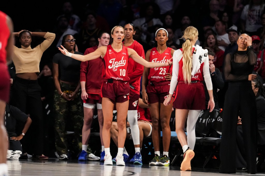 Indiana Fever guard Lexie Hull (10) reacts to the action Thursday, Oct. 1, 2026, during the second half of Game 3 of the first round of the WNBA Playoffs