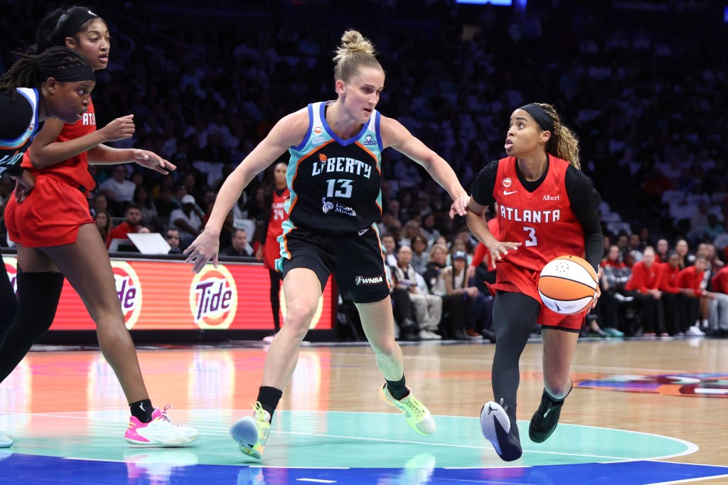 Leonie Fiebich guards Jordin Canada as Canada drives with the ball