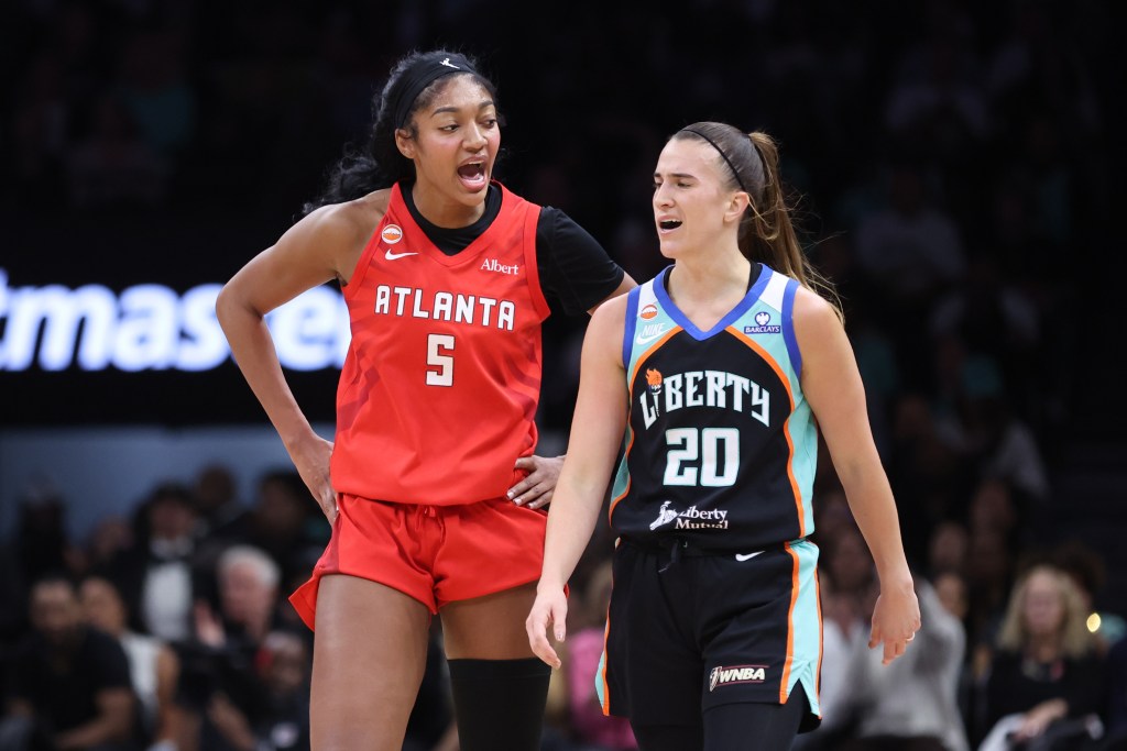 Angel Reese and Sabrina Ionescu bark at each other after Ionescu set a hard screen.