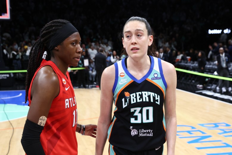 Breanna Stewart wears her emotions while Rhyne Howard speaks to her after the Liberty fell to the Dream