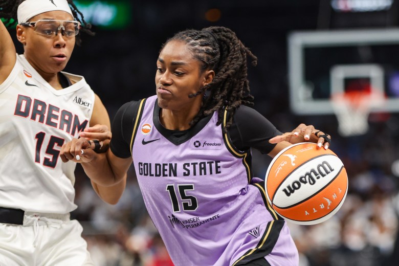 Golden State Valkyries guard Tiffany Hayes (15) drives on Atlanta Dream guard Allisha Gray (15) in the third quarter during game four of the 2026 WNBA Finals at State Farm Arena.