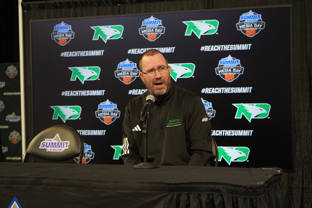North Dakota head coach Dennis Hutter talks to the media during 2026 Summit League Media Day.