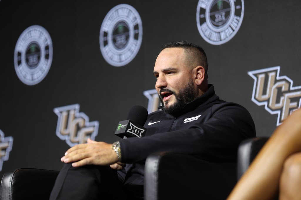 New UCF women's basketball coach Gabe Lazo talks to the media during the 2026 Big 12 Media Days event in Kansas City, MO.